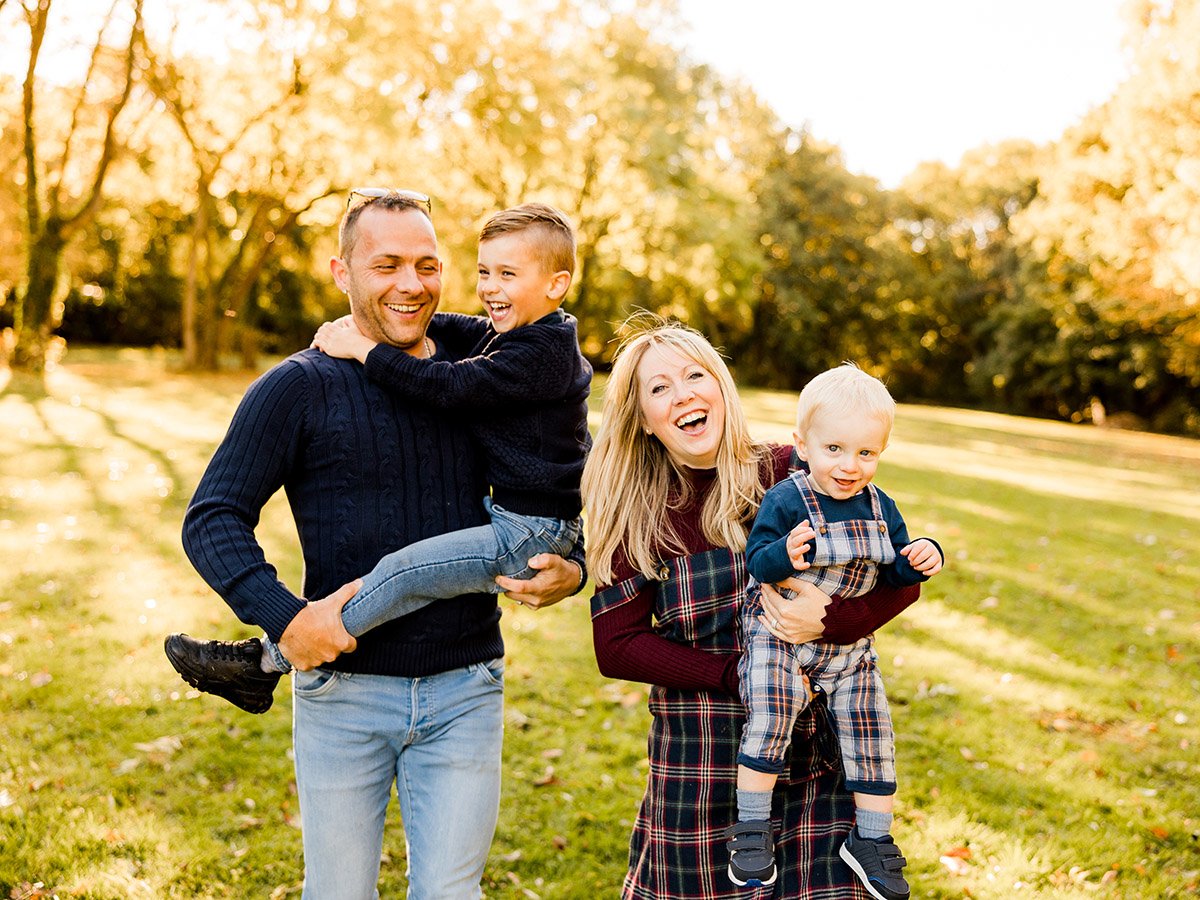 Family in grass meadow